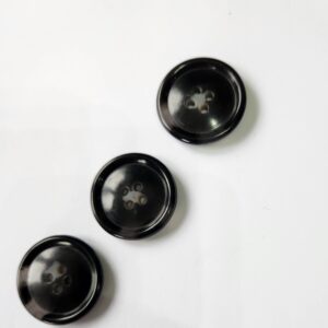 bouton rond noir marbré