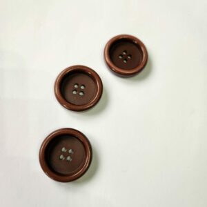 bouton rond brun foncé